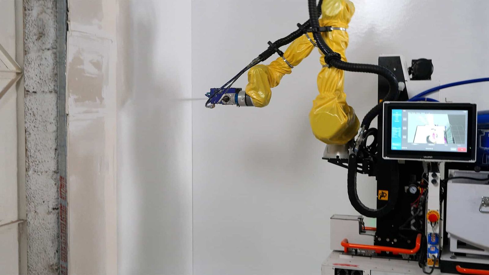 Okibo robot spray-painting a wall